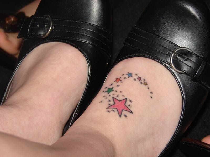 Star Tattoos On The Foot. dresses stars tattoos on foot.